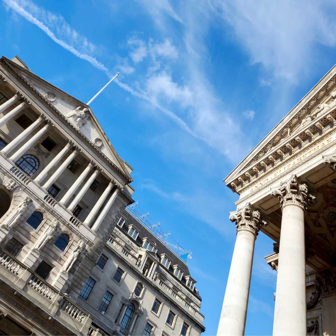 Bank of England building alongside the Corinthian columns of the Royal Exchange in the City of London, the historic financial district hosting major law firms, investment banks and advisory boutiques.